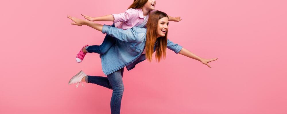 Funny foxy little lady and her mom participants ready steady go wear casual clothes isolated pink background